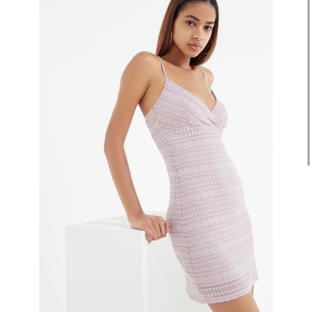 Lace Body Con Mini dress with V neck line